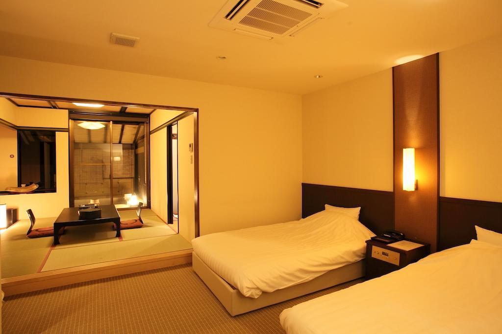 Hotel Yumeshizuku Minamiaso Kamer foto